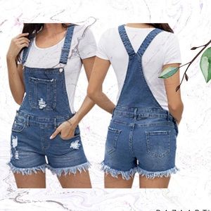 Medium BNWT 8-10 (9-11 juniors) blue overalls.